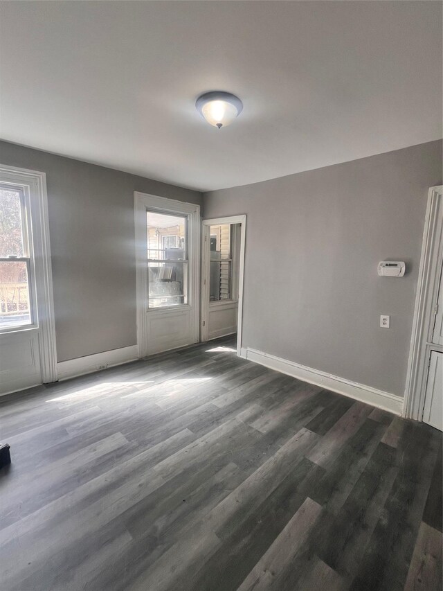 27 Hooker Ave, Poughkeepsie, NY 12601 - empty room featuring healthy amount of natural light and wood finished floors