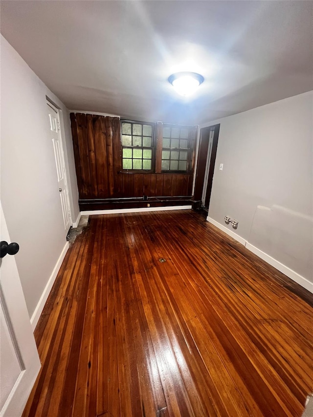 27 Hooker Ave, Poughkeepsie, NY 12601 - spare room with dark wood-style floors and baseboards