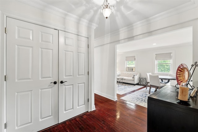 1833 Palmer Ave Unit 2C, Larchmont, NY 10538 - bedroom with dark wood-style floors, baseboards, crown molding, a closet, and a chandelier