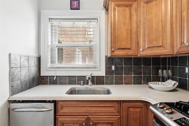 1833 Palmer Ave Unit 2C, Larchmont, NY 10538 - kitchen with dishwasher, a sink, light countertops, and range