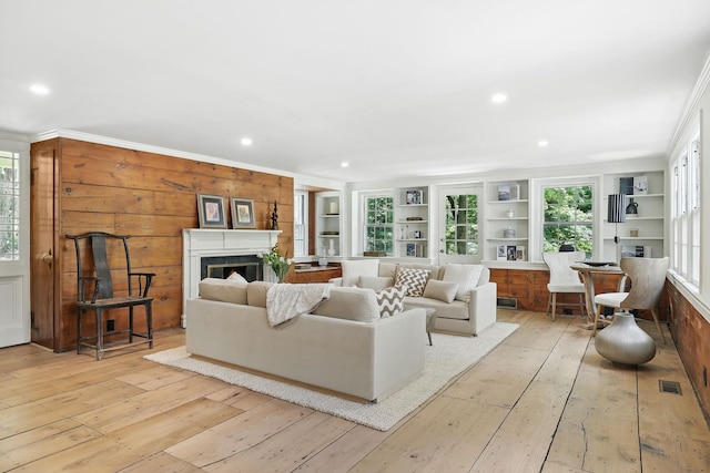 200 Millwood Rd, Chappaqua, NY 10514 - living room featuring a fireplace, light wood finished floors, recessed lighting, and crown molding