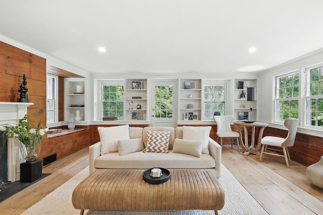 200 Millwood Rd, Chappaqua, NY 10514 - living area with light wood-style flooring, recessed lighting, crown molding, and a fireplace with flush hearth