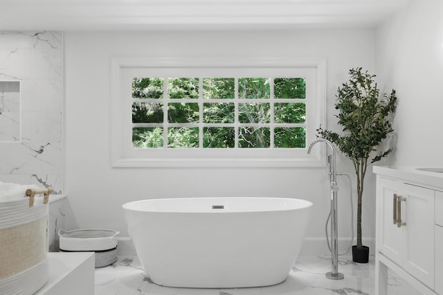 200 Millwood Rd, Chappaqua, NY 10514 - bathroom with marble finish floors, a freestanding tub, vanity, and baseboards