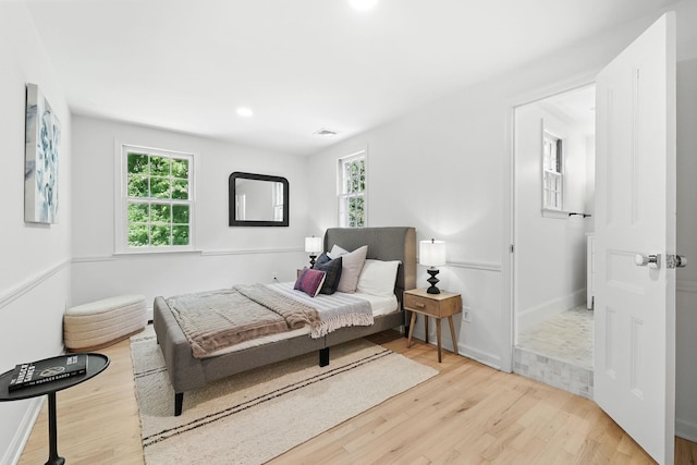 200 Millwood Rd, Chappaqua, NY 10514 - bedroom with multiple windows, wood finished floors, and baseboards