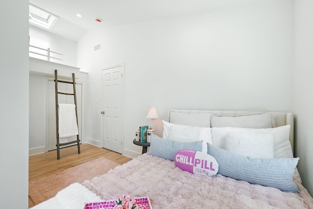200 Millwood Rd, Chappaqua, NY 10514 - bedroom with wood finished floors, high vaulted ceiling, and baseboards