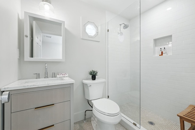 200 Millwood Rd, Chappaqua, NY 10514 - full bath featuring vanity, tiled shower, toilet, and tile patterned floors