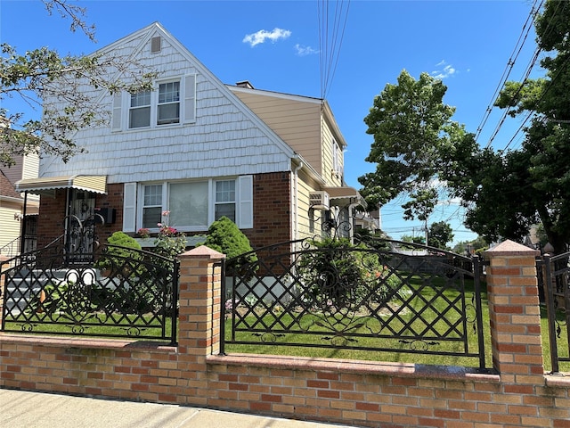 161-04 119th Rd, Jamaica, NY 11434 - view of front of property featuring a fenced front yard and brick siding