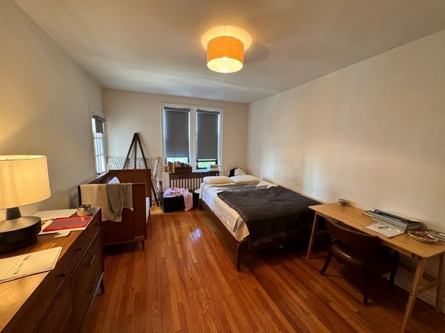 30 Clinton Pl Unit 6E, New Rochelle, NY 10801 - bedroom featuring wood finished floors