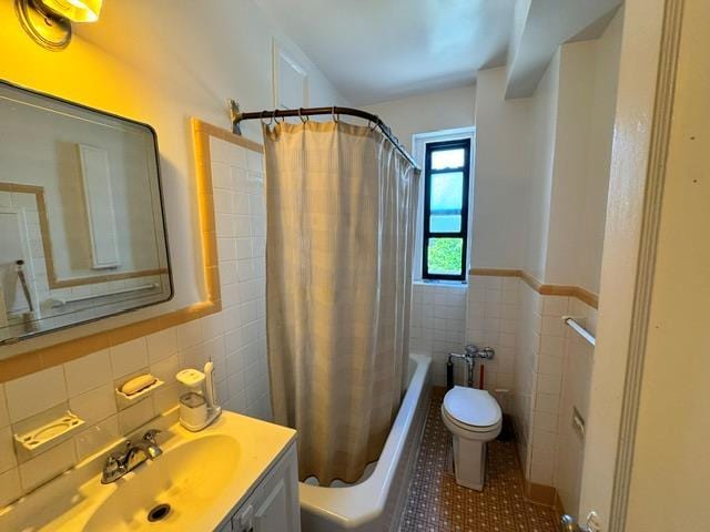30 Clinton Pl Unit 6E, New Rochelle, NY 10801 - bathroom featuring tile walls, shower / bathtub combination with curtain, vanity, and tile patterned floors