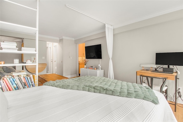 210 E 63rd St Unit 10E, New York Manhattan, NY 10065 - bedroom with crown molding, light wood-style flooring, and baseboards