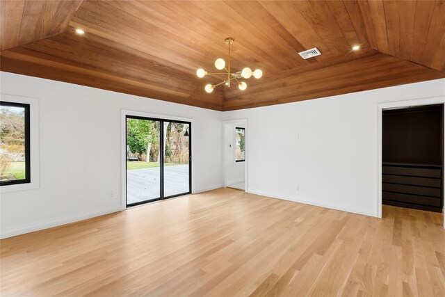 10 Lenape Rd, Southampton, NY 11968 - empty room featuring wooden ceiling, vaulted ceiling, a chandelier, light wood-type flooring, and stairs