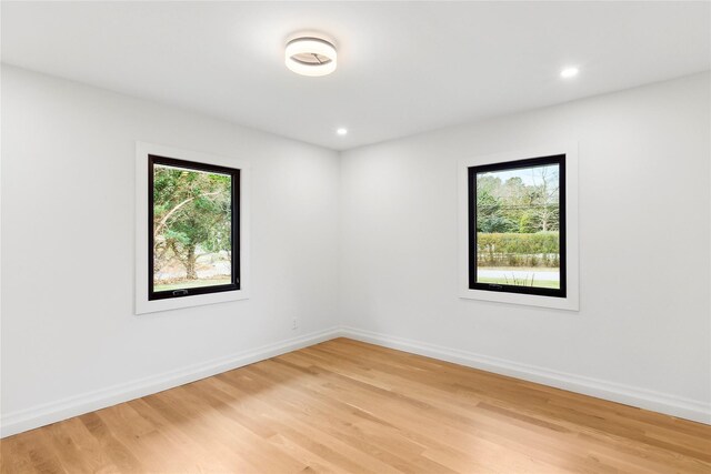 10 Lenape Rd, Southampton, NY 11968 - unfurnished room featuring healthy amount of natural light, light wood-style floors, baseboards, and recessed lighting