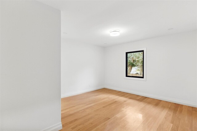 10 Lenape Rd, Southampton, NY 11968 - spare room featuring light wood-style floors and baseboards