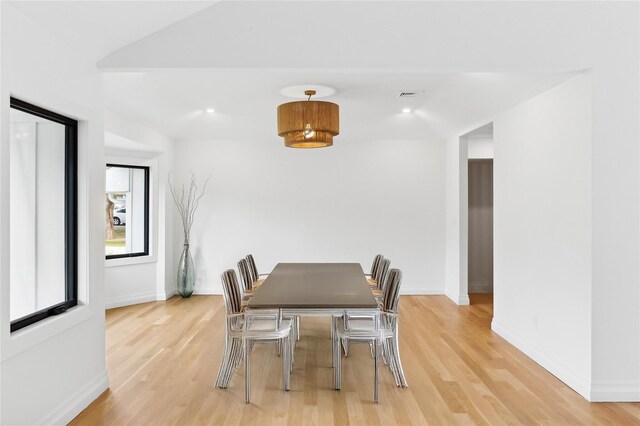 10 Lenape Rd, Southampton, NY 11968 - dining space with light wood-style floors and baseboards