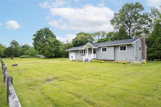 7 Searington Dr, Syosset, NY 11791 - back of property with a chimney and a lawn