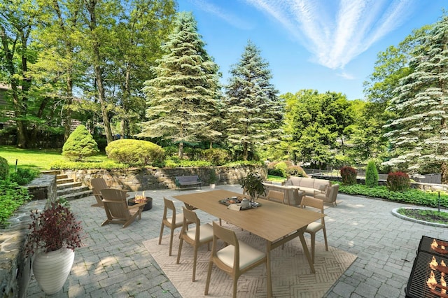 125 Park Ln, West Harrison, NY 10604 - view of patio / terrace with an outdoor living space with a fire pit