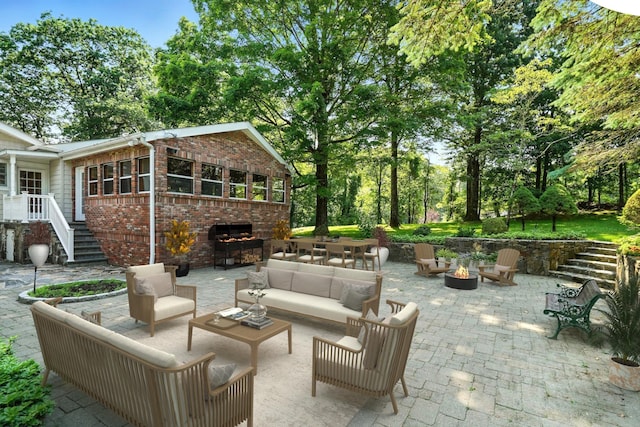 125 Park Ln, West Harrison, NY 10604 - view of patio / terrace with area for grilling and an outdoor living space with a fire pit