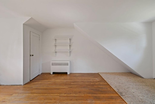4 W Burda Pl, New City, NY 10956 - bonus room with radiator, wood finished floors, and vaulted ceiling