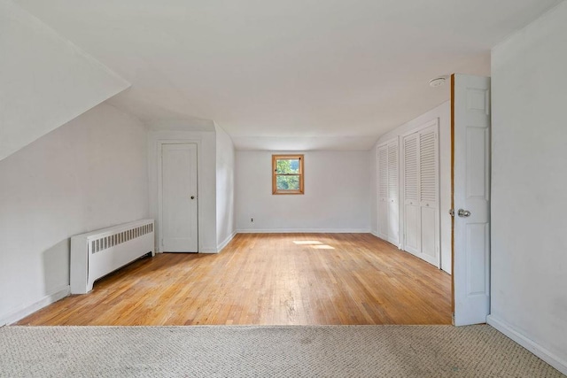 4 W Burda Pl, New City, NY 10956 - additional living space featuring radiator heating unit, baseboards, and wood finished floors