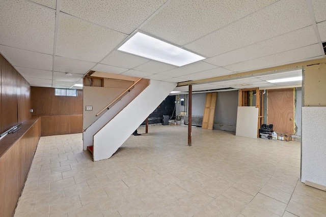4 W Burda Pl, New City, NY 10956 - below grade area with wooden walls, stairway, and a paneled ceiling