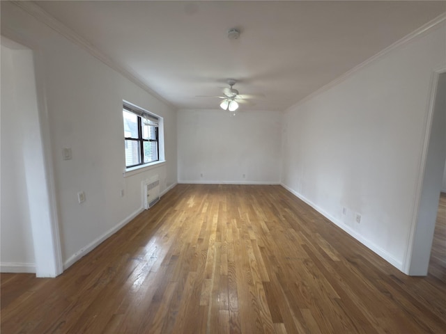 240 Halstead Ave Unit C8, Harrison, NY 10528 - unfurnished room with ceiling fan, wood finished floors, baseboards, crown molding, and a smoke detector