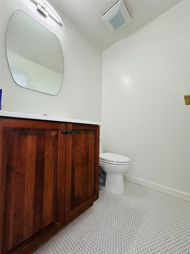 12 Yale Dr, Manhasset, NY 11030 - bathroom featuring toilet, vanity, and baseboards