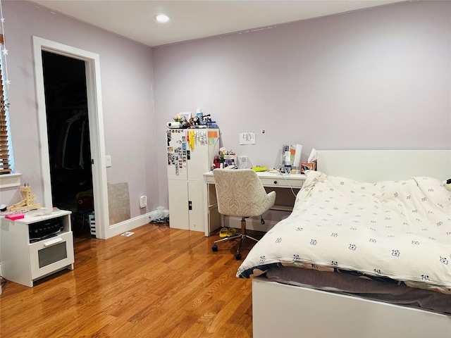 12 Yale Dr, Manhasset, NY 11030 - bedroom with light wood finished floors and recessed lighting