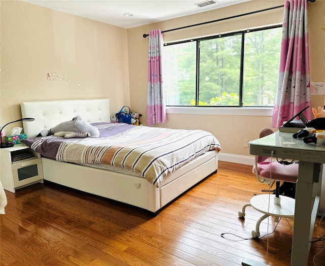 12 Yale Dr, Manhasset, NY 11030 - bedroom featuring baseboards and wood finished floors
