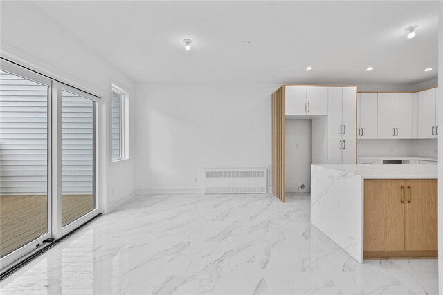 244 Blauvelt Rd Unit 213, Monsey, NY 10952 - kitchen with light marble finish flooring, white cabinetry, and recessed lighting