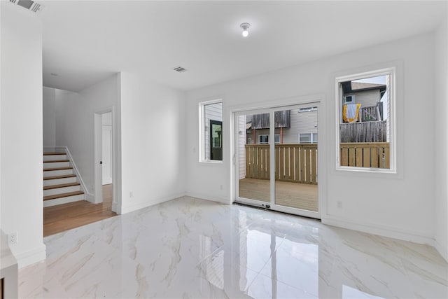 244 Blauvelt Rd Unit 213, Monsey, NY 10952 - spare room featuring marble tiled floors and stairs