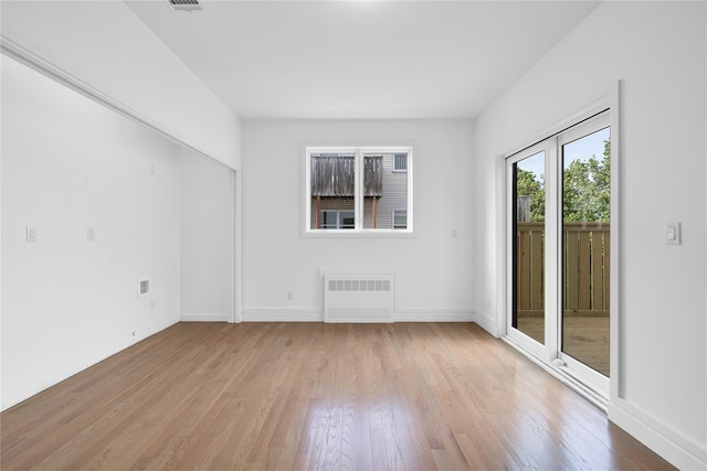 244 Blauvelt Rd Unit 213, Monsey, NY 10952 - unfurnished room featuring radiator heating unit and light wood finished floors