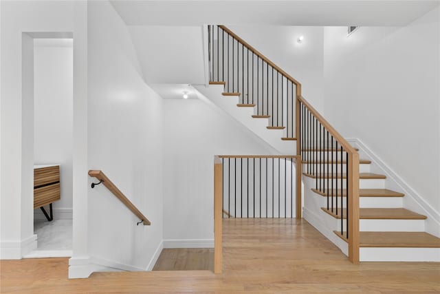244 Blauvelt Rd Unit 213, Monsey, NY 10952 - stairs with wood finished floors and baseboards