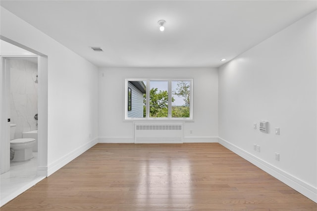 244 Blauvelt Rd Unit 213, Monsey, NY 10952 - empty room with radiator, wood finished floors, and recessed lighting