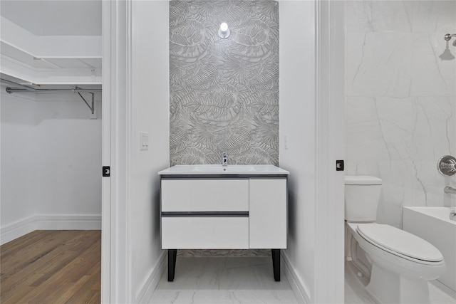 244 Blauvelt Rd Unit 213, Monsey, NY 10952 - bathroom with vanity, a spacious closet, and  shower combination