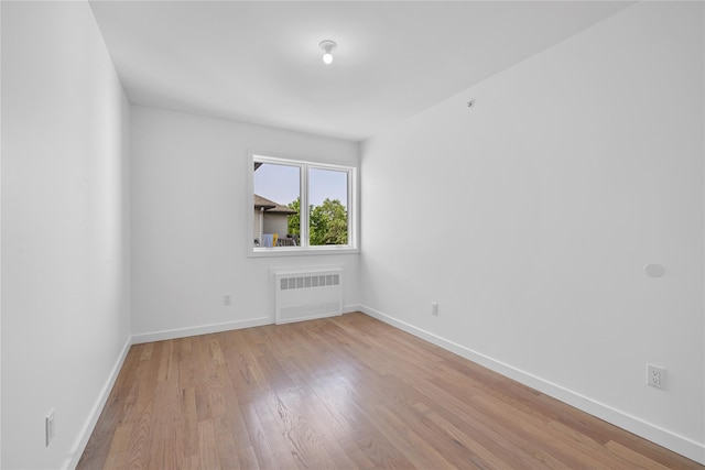 244 Blauvelt Rd Unit 213, Monsey, NY 10952 - empty room with radiator and wood finished floors