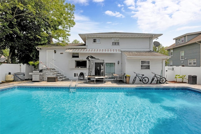 32 Cedar St, Lindenhurst, NY 11757 - view of pool featuring a patio area and area for grilling