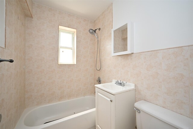 20-21 Parsons Blvd, Whitestone, NY 11357 - bathroom featuring tile walls, vanity, and shower / bath combination