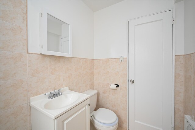 20-21 Parsons Blvd, Whitestone, NY 11357 - half bath with tile walls, vanity, and wainscoting