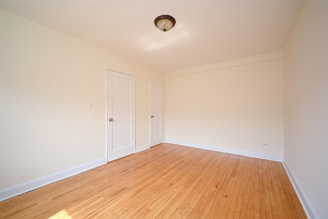20-21 Parsons Blvd, Whitestone, NY 11357 - spare room featuring light wood-type flooring and baseboards