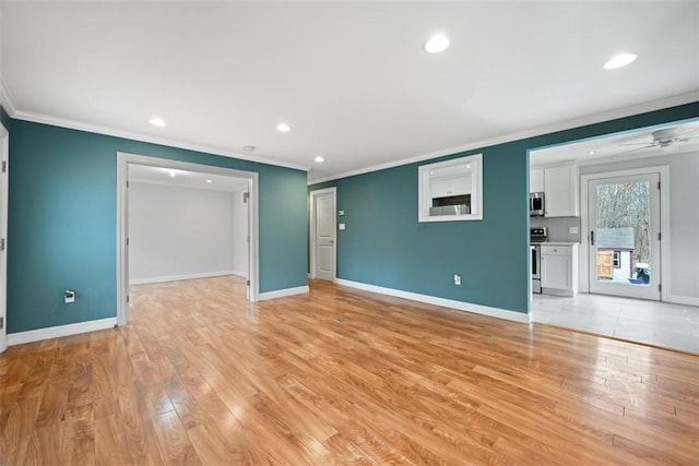513 3rd St, Newburgh, NY 12550 - unfurnished living room with ornamental molding, recessed lighting, light wood-type flooring, and a ceiling fan