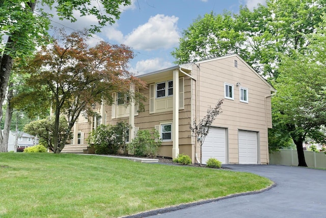11 Claremont Ln, Suffern, NY 10901 - view of front facade featuring an attached garage and driveway