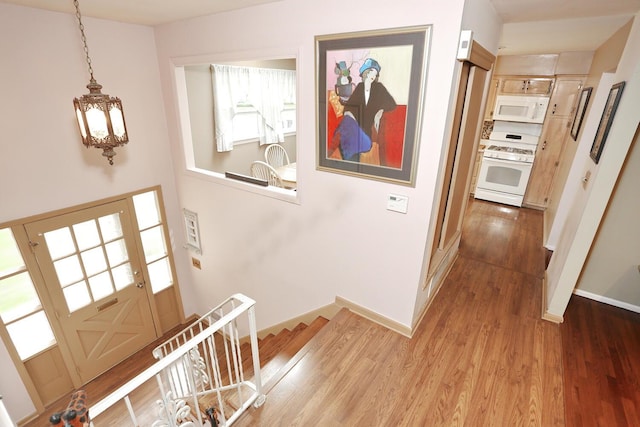 11 Claremont Ln, Suffern, NY 10901 - entrance foyer with wood finished floors and a chandelier