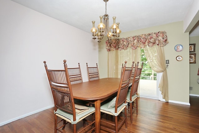 11 Claremont Ln, Suffern, NY 10901 - dining area with a chandelier and wood finished floors