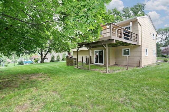 11 Claremont Ln, Suffern, NY 10901 - rear view of house featuring a yard and a wooden deck