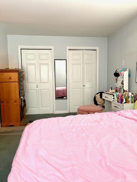 148 Bch 97th St, Rockaway Beach, NY 11693 - carpeted bedroom with two closets
