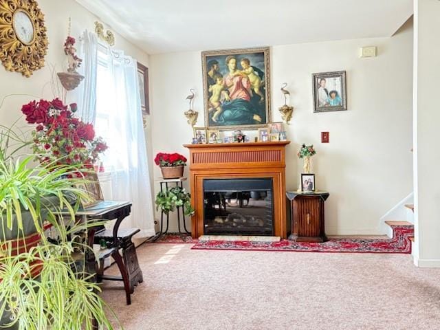 148 Bch 97th St, Rockaway Beach, NY 11693 - sitting room featuring carpet, a glass covered fireplace, and stairs