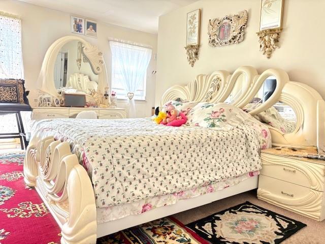 148 Bch 97th St, Rockaway Beach, NY 11693 - bedroom with carpet flooring