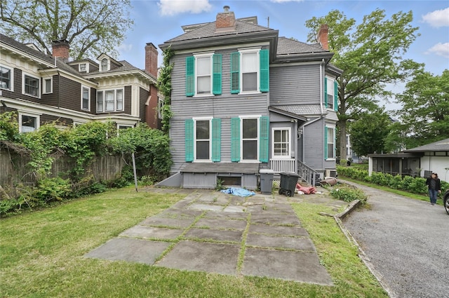 25 Garfield Pl, Poughkeepsie, NY 12601 - back of property with a chimney