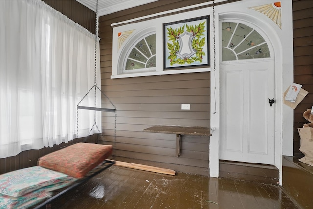25 Garfield Pl, Poughkeepsie, NY 12601 - living area featuring wooden walls and hardwood / wood-style flooring