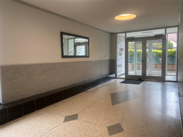 83-36 Beverly Rd Unit 5A, Kew Gardens, NY 11415 - community lobby featuring a wainscoted wall